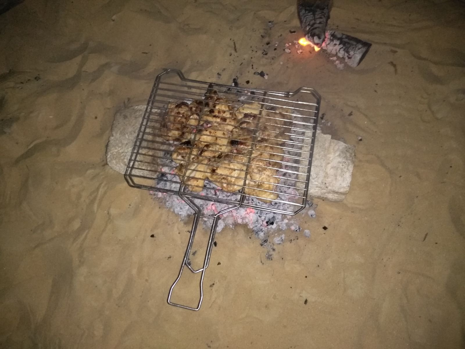 Barbecue prepared at desert camp